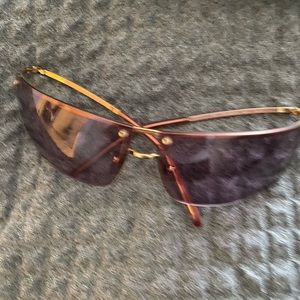 Pink Gucci wrap sunglasses